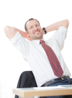Fotolia_49179382_XS_-_businessmann_entspannt.jpg